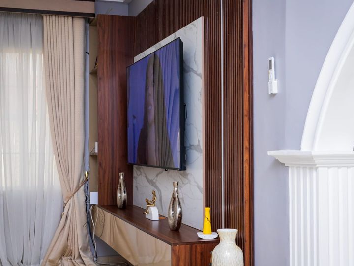 Lounge with wood-slat TV wall